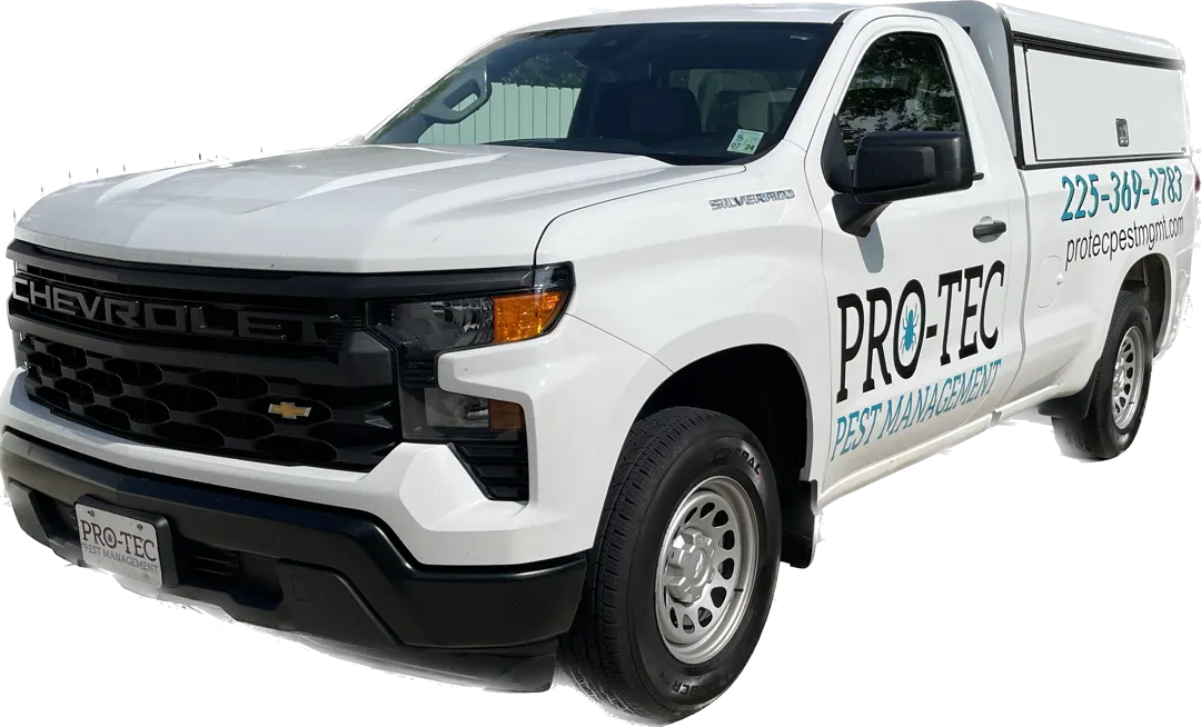 Pro-Tec Pest Management service truck on a residential property in Mississippi